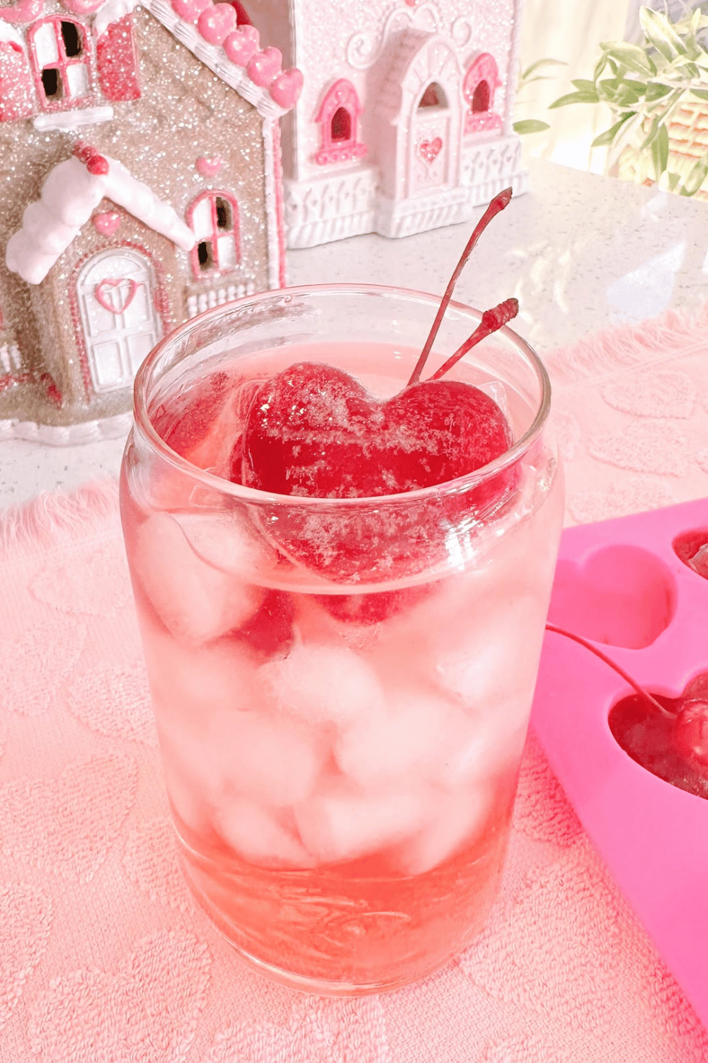 Cherry juice drink with heart shaped ice cubes