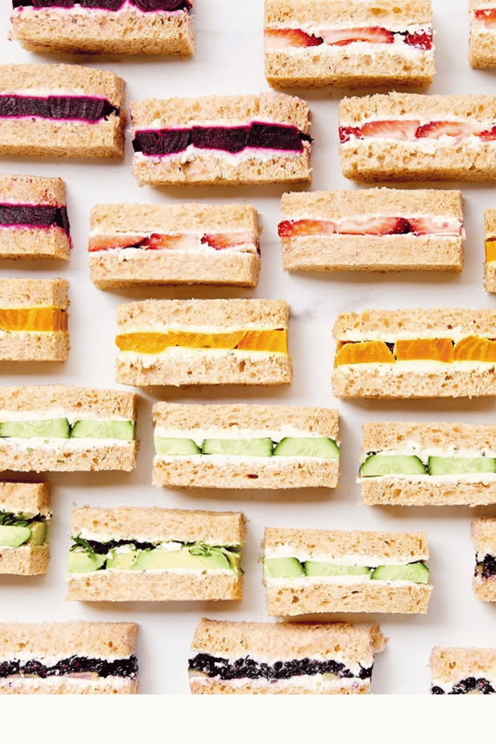 Colorful tea sandwiches arranged for Galentine’s gatherings
