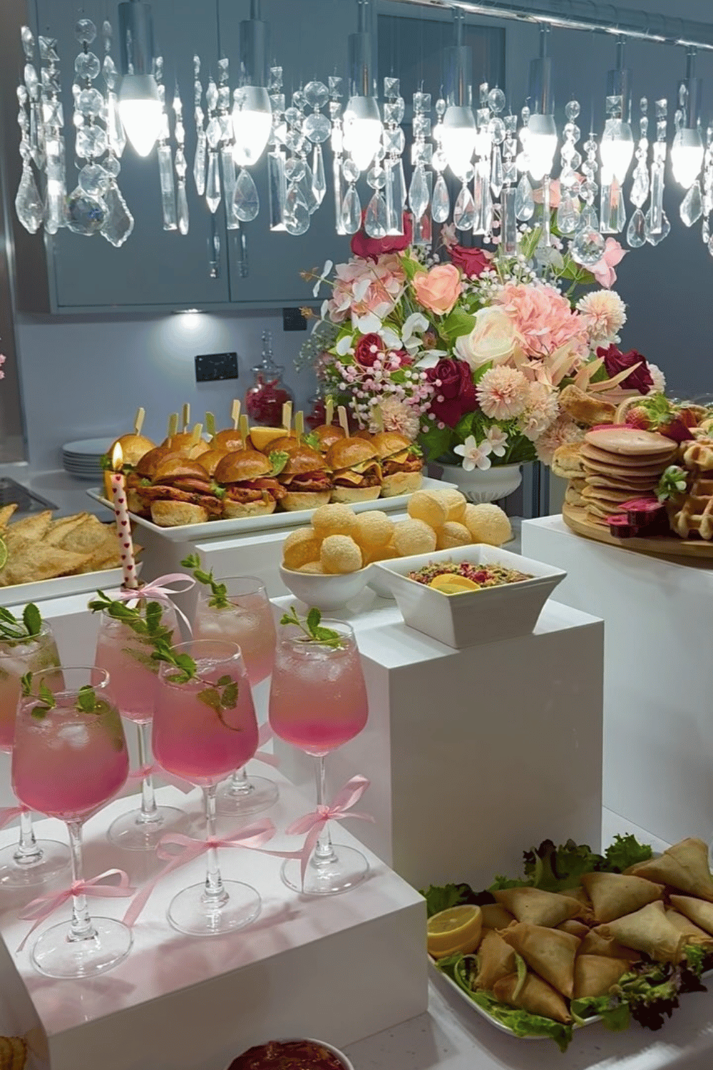 Galentine’s party food table with sliders, drinks, and finger food