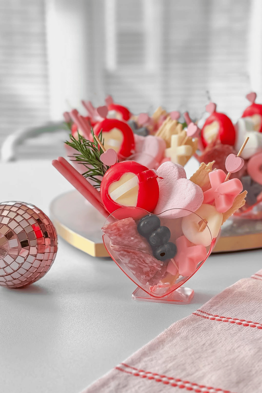 Mini heart-shaped charcuterie cups for Galentine’s Day