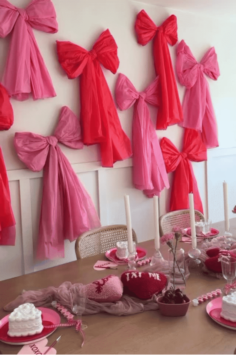 Tissue paper bow wall decor for galentine’s party