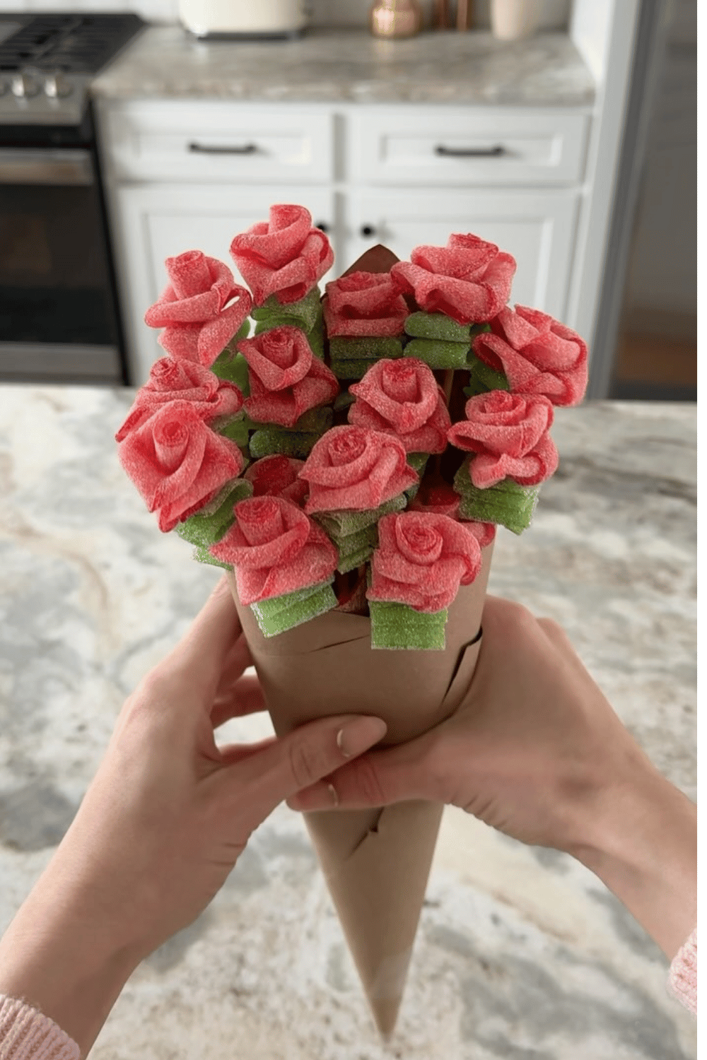 Candy rose bouquet made from pink sweets for galentine’s party snack
